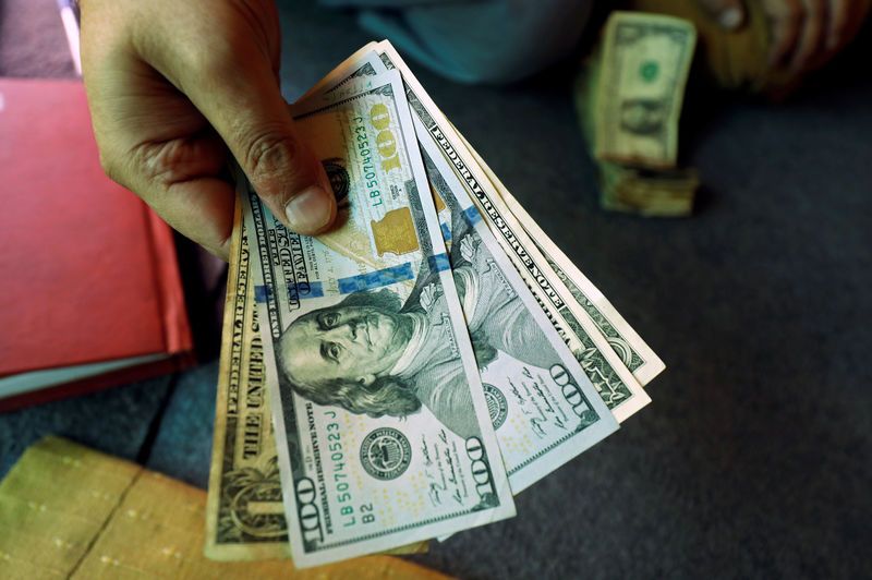 Dollar greater; hawkish Fed officers, debt ceiling uncertainty helps
