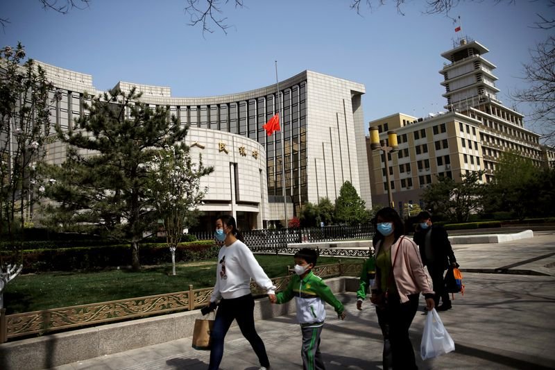 China cuts lending benchmark price as financial recovery sputters