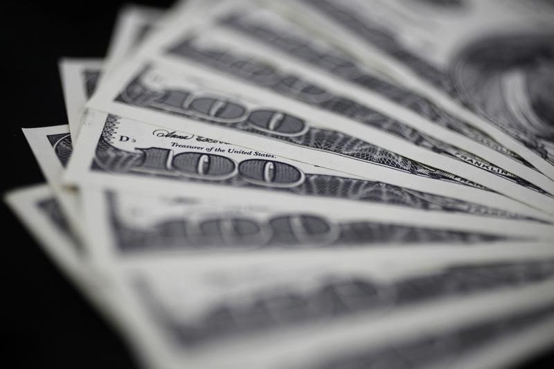 Dollar retreats from two-week high forward of Fed decision