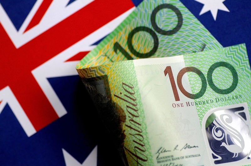 Asia FX slips as Fed hike approaches, Aussie slides on used CPI