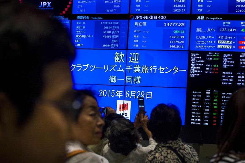Asian shares hit by tech losses as Fitch cuts U.S. rating
